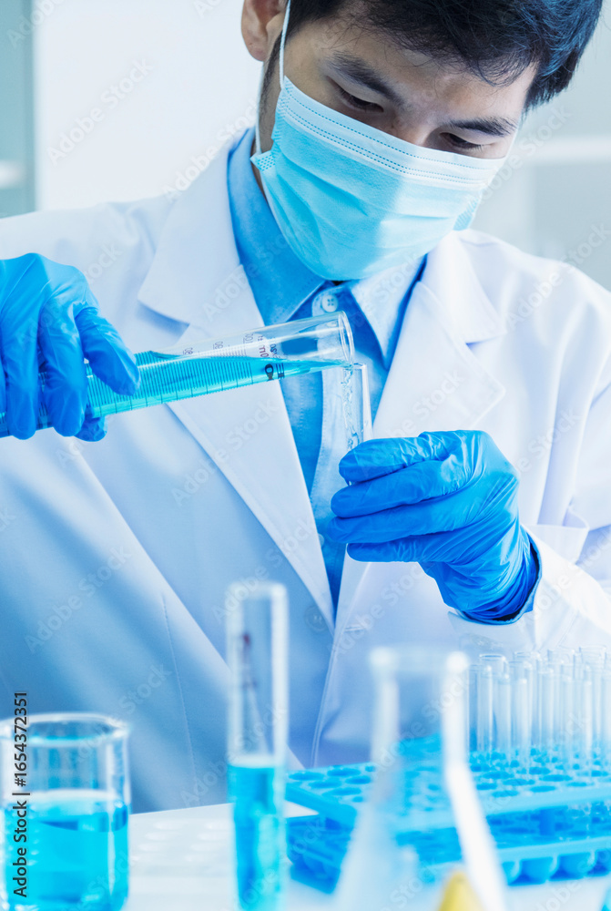 Vertical Horizon Scientist man holding chemical test glass tube science laboratory. Doctor clinic lab technician diagnosis sample. Vertical Asian scientist man test vaccine medical biochemistry lab Vertical Horizon Scientist man holding chemical test glass tube science laboratory. Doctor clinic lab technician diagnosis sample. Vertical Asian scientist man test vaccine medical biochemistry lab