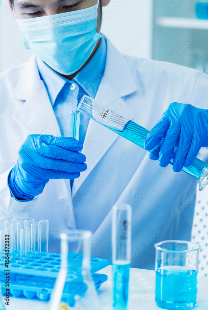 Vertical Horizon Scientist man holding chemical test glass tube science laboratory. Doctor clinic lab technician diagnosis sample. Vertical Asian scientist man test vaccine medical biochemistry lab Vertical Horizon Scientist man holding chemical test glass tube science laboratory. Doctor clinic lab technician diagnosis sample. Vertical Asian scientist man test vaccine medical biochemistry lab