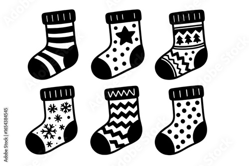 Set of Christmas socks vector icons. Black and white doodle stocking collection. Xmas holiday graphic design elements with festive patterns. Cute cartoon winter illustration.