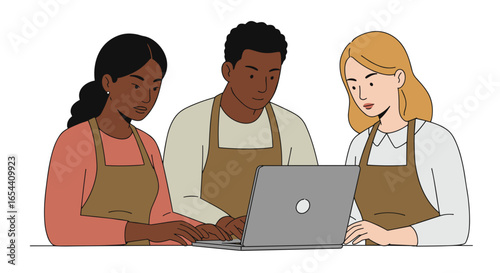 Three people working together on a laptop wearing aprons