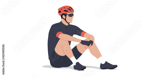 Cyclist resting on the ground with helmet and sunglasses on