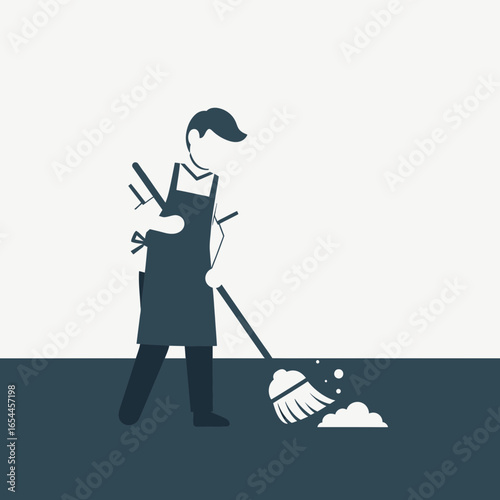 Person in apron sweeping floor with broom and dustpan