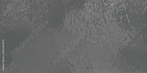 Textured and mottled grey design evoking an organic appearance suitable for decorative elements or surface pattern creation.