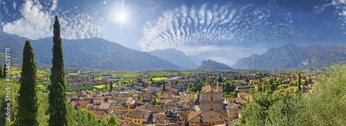 Old idyllic town surrounded by mountains with the Collegiata dell'Assunta church and fascinating sky, Castello di Arco, Arco, Valle de Sarco, Lake Garda North, Trento, Trentino-Alto Adige, Italy