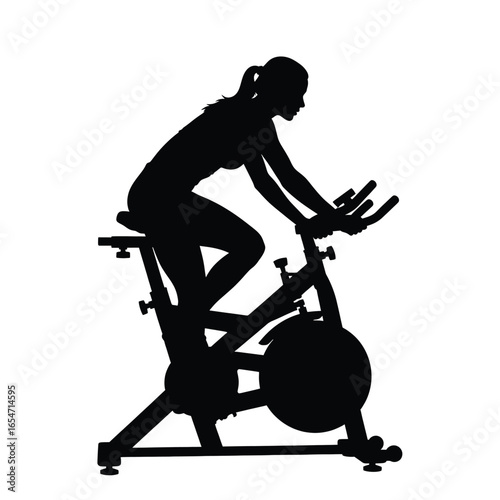 Silhouette of a woman exercising on a stationary bike in a gym isolated on white background