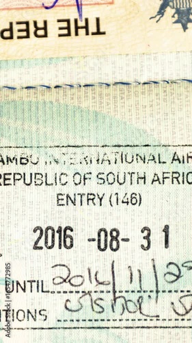 collection of passport stamps and visas in vertical