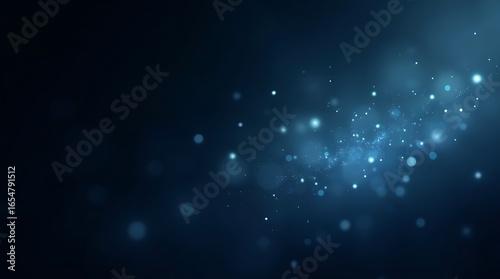 Abstract blue bokeh lights on dark background