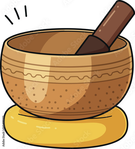 Tibetan singing bowl with mallet resting on a yellow cushion symbolizing meditation and healing sounds