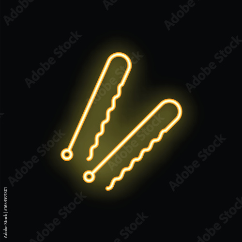 Yellow neon sign representing two hairpins, for hairdressing salon or fashion industry