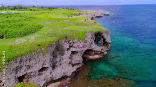 The magnificent cliffs of Manzamo and the emerald sea