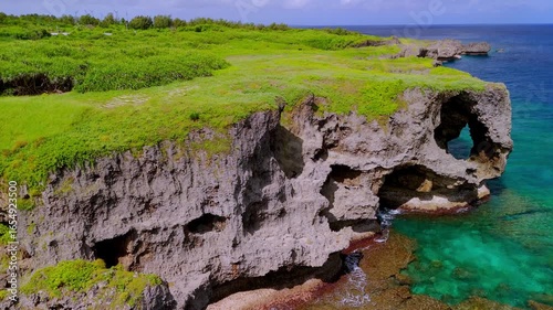 The magnificent cliffs of Manzamo and the emerald sea