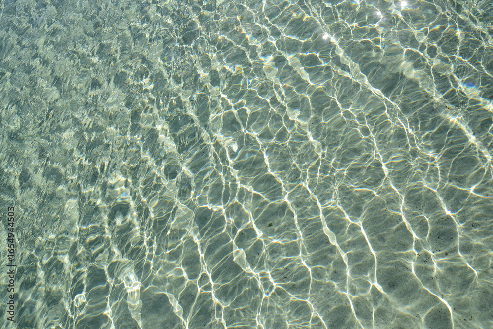 Fototapeta premium Crystal clear water on the beach in Sardinia