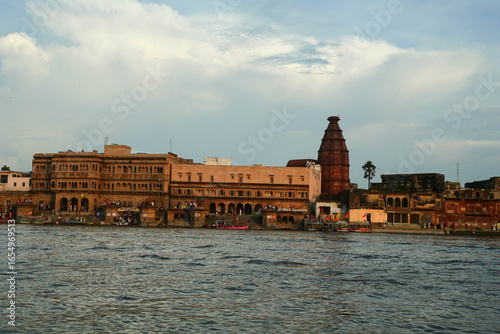 Fotografi Boat riding view in Ancient Shri Yamuna Temple ghat view, Vrindavan, Mathura, Uttar Pradesh, India