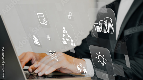 Teamwork and synergy: a holographic image of business icons symbolizing the joint process of successfully implementing projects and business strategies.