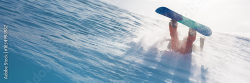 Snowboarder Wiping Out on Snowy Mountain Wide Banner