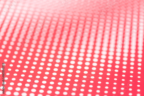 Red and white abstract background. Halftone pattern paper design. Selective focus