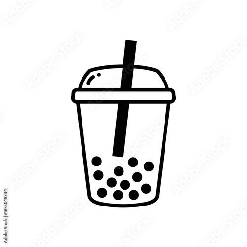 Bubble tea in a clear cup with a straw and tapioca pearls  