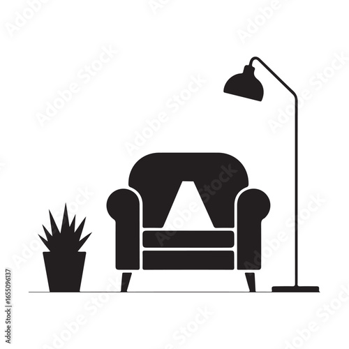 Black armchair with floor lamp and potted plant interior