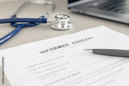 Informed Consent form on doctor desk