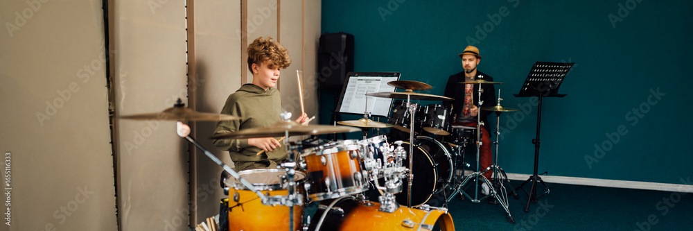 Fototapeta premium Drummers in Rehearsal Room Wide Banner