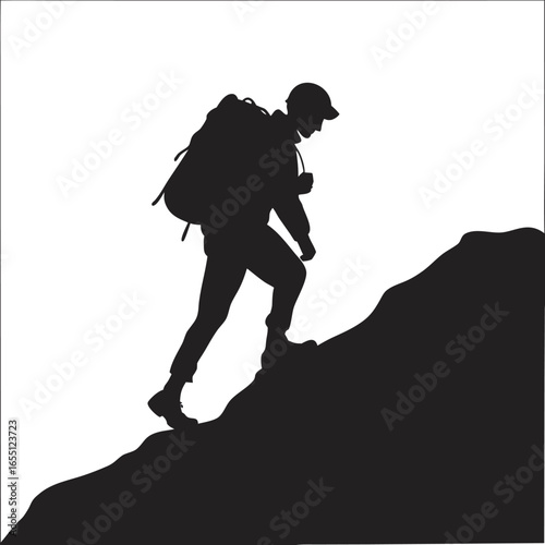 Hiker on mountain ridge silhouette