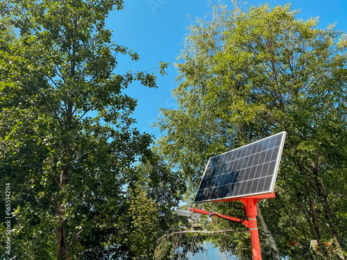 The process of Solar Panel Installation Surrounded by Trees is a remarkable and ecofriendly energy solution that harnesses sunlight, promoting sustainability and a greener environment
