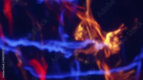 Mesmerizing Abstract Dance of Fiery Red, Electric Blue, and Golden Orange Light Trails in Darkness