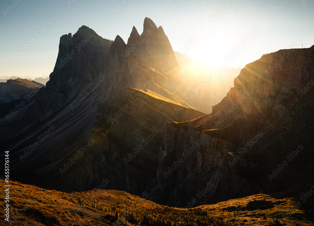 Naklejka premium Sunrise in the mountains at Seceda in the Dolomites, Italy.