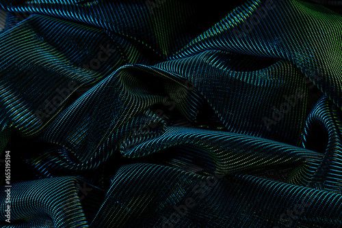 Iridescent metallic fabric with dynamic folds and shimmering bokeh highlights, evoking futuristic design, motion, and abstract elegance in a vibrant, high-energy textile background composition