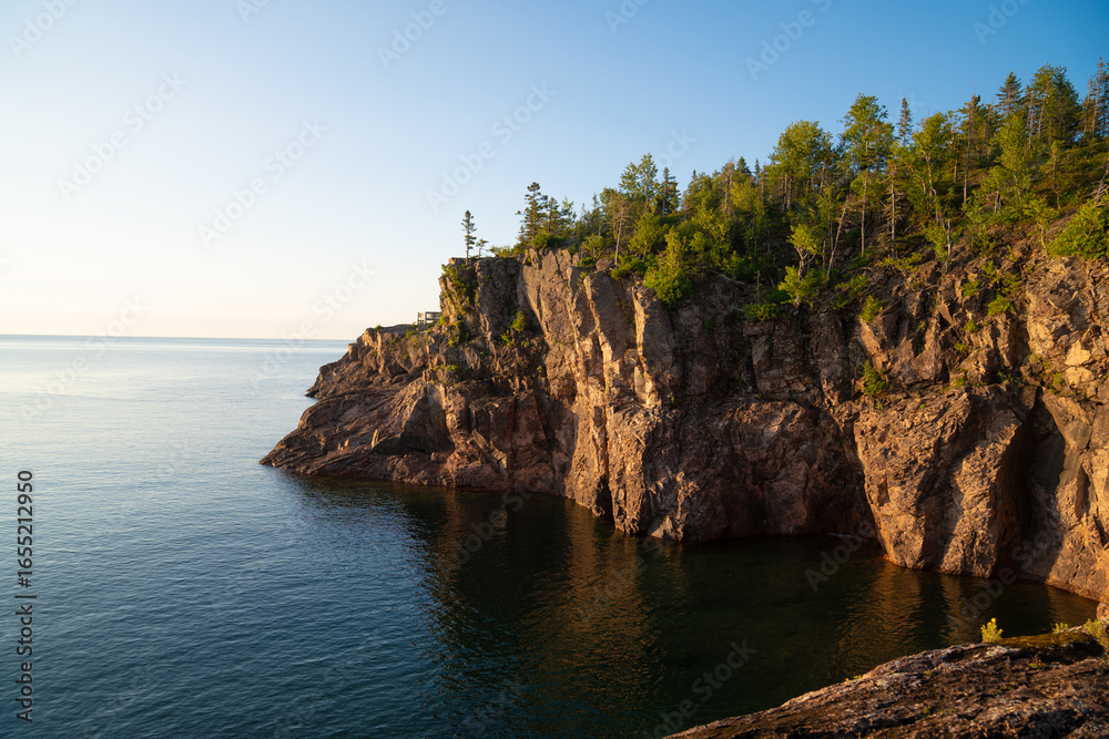 Fototapeta premium Summer sunset over Lake Superior's shores in Minnesota North Shore