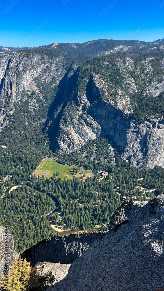 Obraz premium mountain landscape, view of Yosemite Valley including Merced river from Glacier Point, in Yosemite National Park in the western Sierra Nevada Mountains of Central California , USA. July 2025 