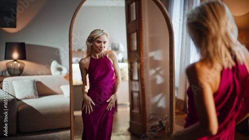 Photos Flirting blonde looking mirror in dress
