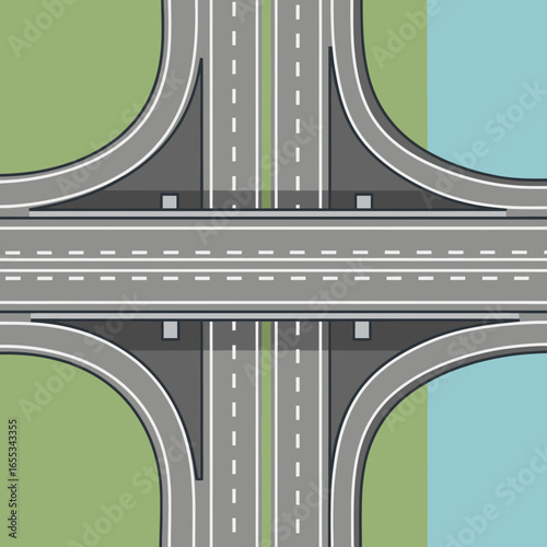 Aerial view of a highway interchange with green and blue background areas.