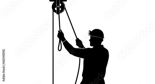 miner operating pulley system ensuring safe and efficient underground material handling