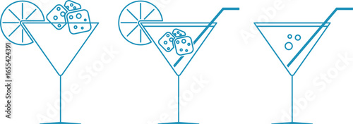 Glass glasses with cocktails. Refreshing drinks with ice and lime. Straw in a glass with a cocktail and bubbles