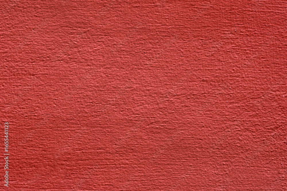 Fototapeta premium Textured red painted surface