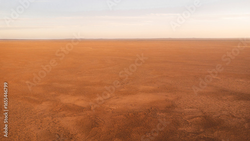 Slika na platnu Drone photography of the dirt road from Quilpie to bedourie