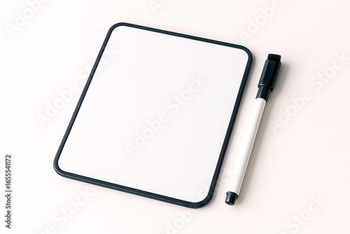 Mini magnetic whiteboard with marker isolated on white background