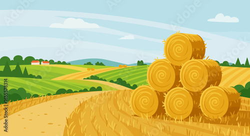 Rural landscape with hay bales stacked in a sunny field