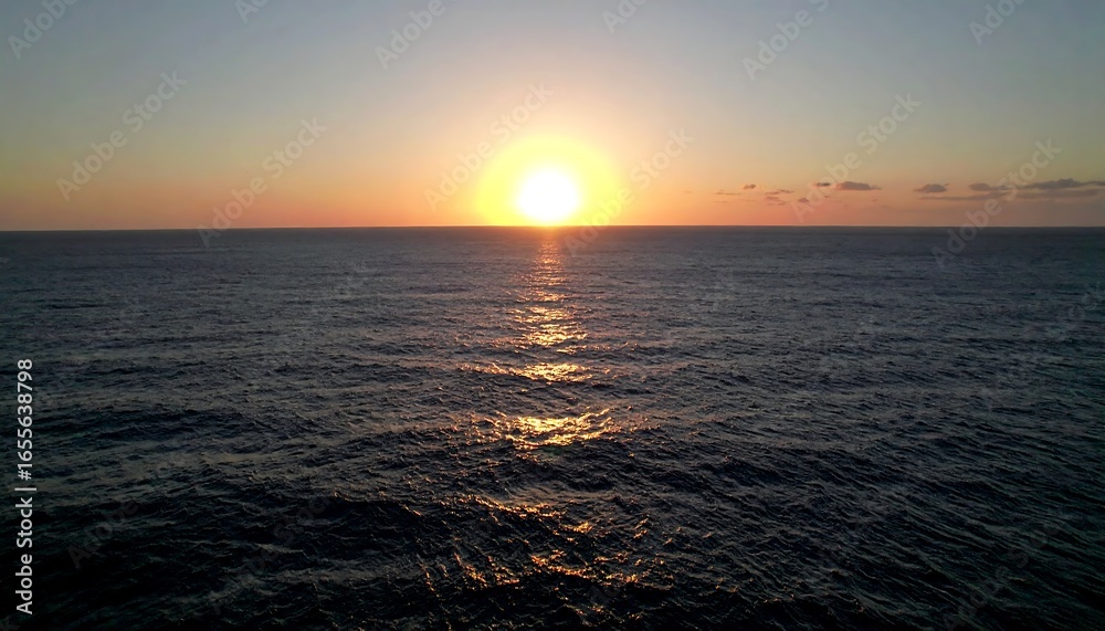 Obraz premium Ocean Sunset with Calm Sea, and Golden Hour. (1)