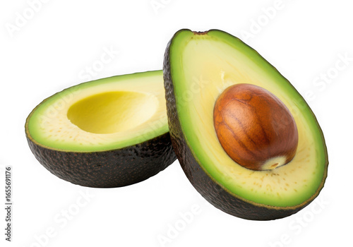 Two avocado halves isolated on transparent background, one with seed, top view