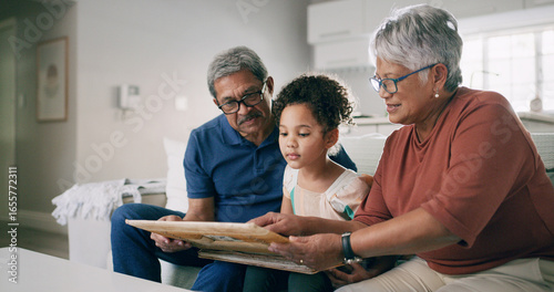 Slika na platnu Grandparents, child and picture frame in home with family to share memory or learning history