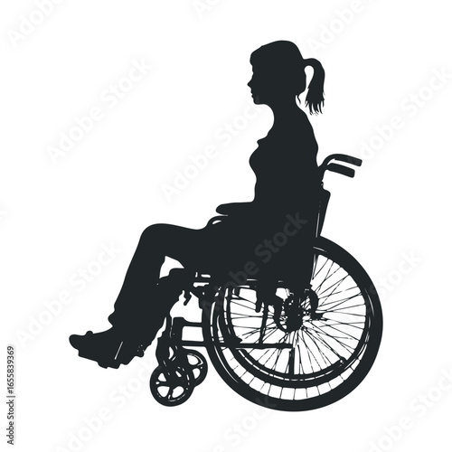 Silhouette of young female in wheelchair profile view
