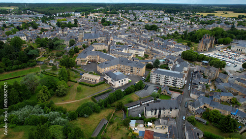  Aerial view around the old town of the city Baugé-en-Anjou in France on a sunny summer morning