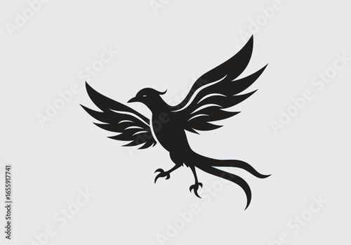 Black silhouette of a stylized phoenix bird with outstretched wings in flight firebird mythical creature