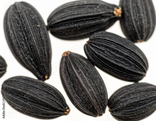 Wallpaper Mural Macro photo of several individual black cumin seeds isolated against a white backgraound Torontodigital.ca