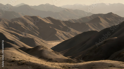 view of layered hills fading into the distance under soft morning haze