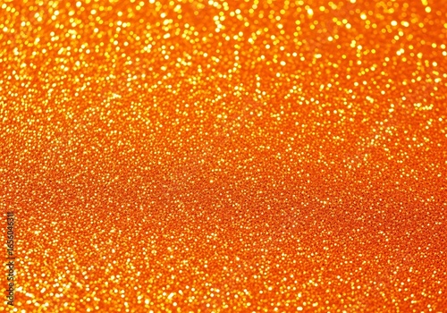 Fototapeta Glittering Amber Radiance A Textured Orange Sparkle Background for Festive Designs