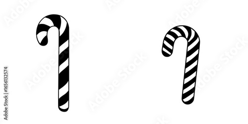 Black and white striped candy canes with curved ends displayed side by side during holiday season