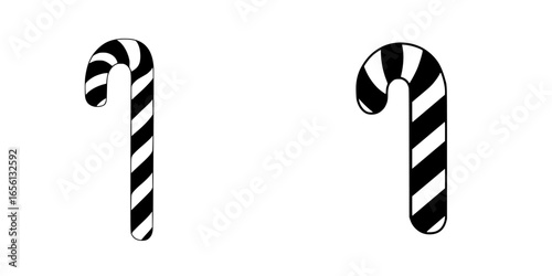 Striped candy canes in black and white for festive decoration and seasonal cheer